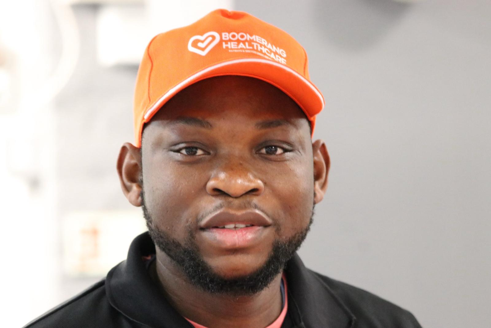 Ola sporting Boomerang Healthcare Cap | Health and Social Care | Boomerang Healtcare | Homecare | Dom Care | Complex Care | LD Care