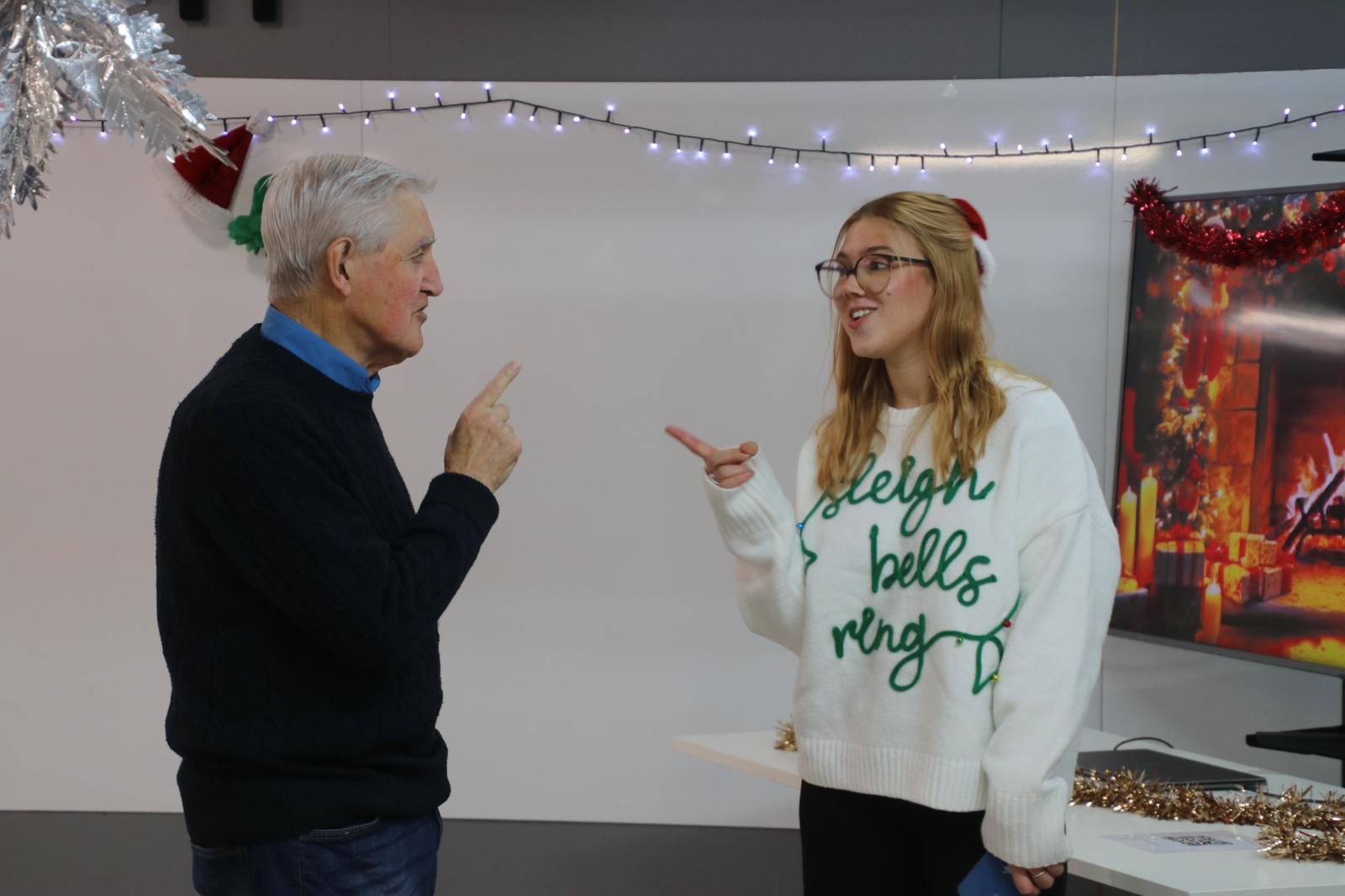 Bob singing Rudold the Rednose Reindeer to the Deputy Manager | Boomerang Healthcare | Dom Care | Home Care